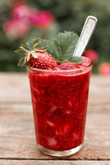 Strawberry smoothie in glass, toned image