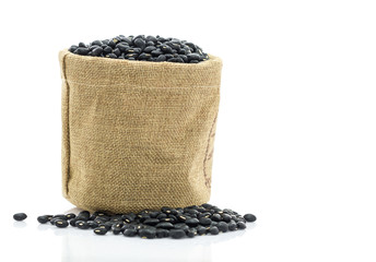 Fototapeta na wymiar Dried black beans in Sacks fodder