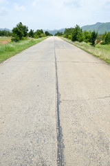 Damaged cement road outside the city