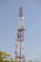 communication towers on sky background