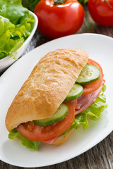 sandwich with ham and fresh vegetables, top view