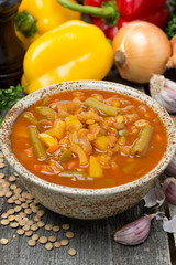 tomato soup with lentils and vegetables, vertical