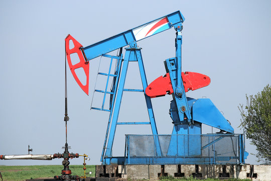 oil pump jack on field