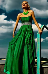 Fototapeta premium sexy stylish blond woman model with red lips in evening dress