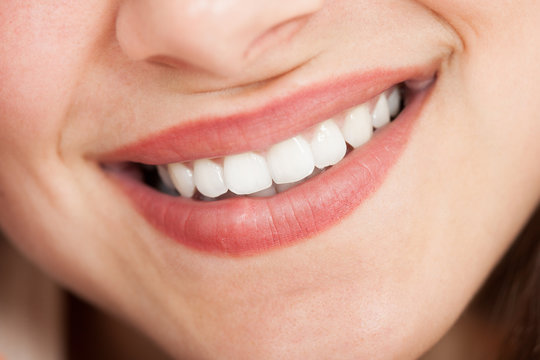Cropped Image Of Woman Smiling