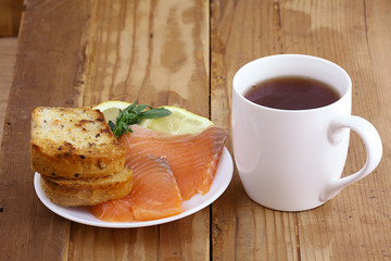 Breakfast tea sandwich with salmon