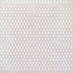 White cream plastic surface with a repeating pattern.