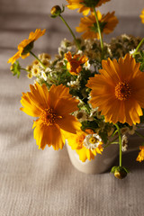 Beautiful wild flowers on table