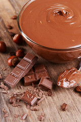 Sweet chocolate cream in bowl on table close-up
