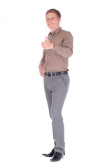 Fototapeta premium Beautiful young man looking at camera and showing thumb up gestu