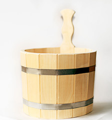 wooden bucket for a bath on a white background