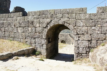 Fototapeta na wymiar Entrance in bulwark of castle in Monsanto, Portugal