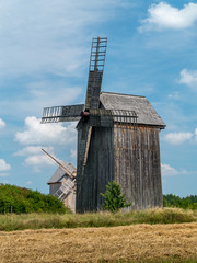 Fototapeta na wymiar Old wooden windmills