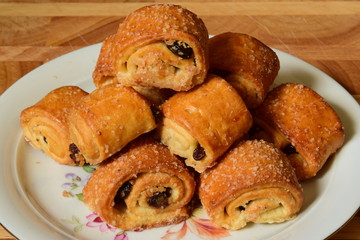 Sweet rolls with raisins on a plate
