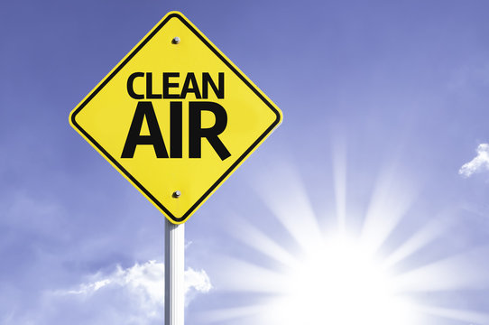Clean Air road sign with sun background