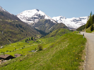 Road with a view over snowy mountain.