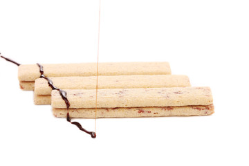 Coated stake wafers of chocolate.