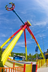 Wide view of a colorful swings in Prater amusement park, Vienna