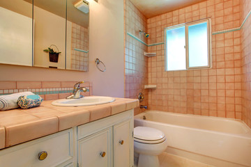 Warm bathroom interior in light peach