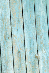 wooden background with old blue paint