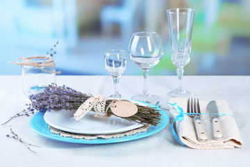 Dining table setting with lavender flowers
