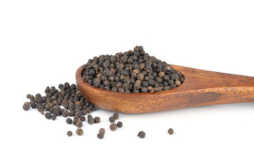 pepper in wooden spoon isolated on white