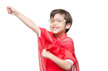 little boy is dressed up as a superhero flying