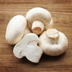 Fresh mushrooms on a wooden board