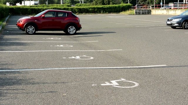 parking spaces in the parking lot for the disabled