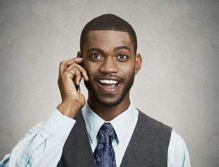 Portrait Happy man Talking on Smart Phone, grey wall background