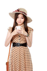 rero asian woman smiling using cellphone