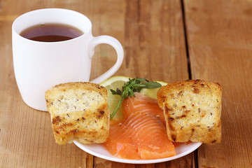 Breakfast tea sandwich with salmon