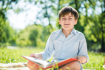 Boy in summer park