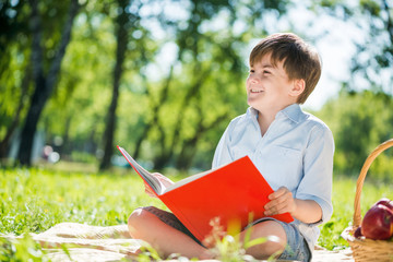 Boy in summer park