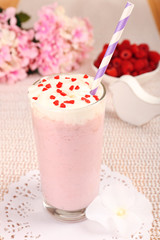 Delicious milkshake on table