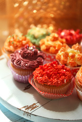 Tasty cupcakes on table, close up