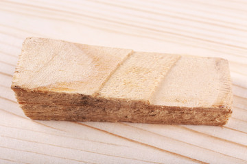 Wood shavings on wooden background