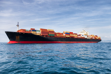 commercial cargo ship carrying containers