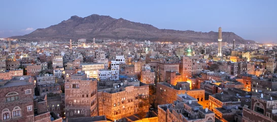 Foto op Canvas Oude Sanaa uitzicht in de schemering, Jemen © Vladimir Melnik