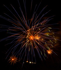 Fototapeta premium Fireworks on the black sky background.
