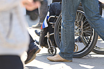 disabled people in the crowd, feet