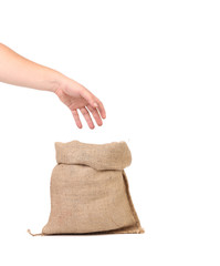 Hand holds bag with euro banknotes.