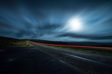 Blur night shoot of fast driving car