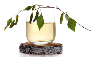 Glass of fresh birch sap isolated on white