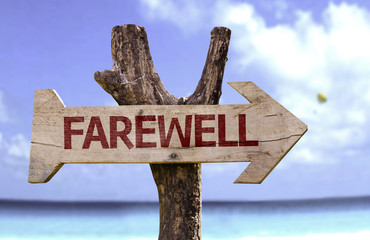 Farewell wooden sign with a beach on background