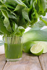 Tuft of sorrel in a glass of fresh vegetable juice, spring