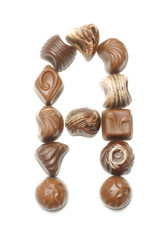 Alphabet letter A arranged from chocolate sweets isolated