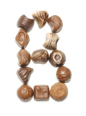 Alphabet letter B arranged from chocolate sweets isolated