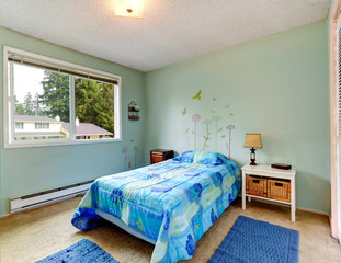 Aqua tones small bedroom with single bed