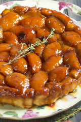 Tarte Tatin with peaches and thyme.